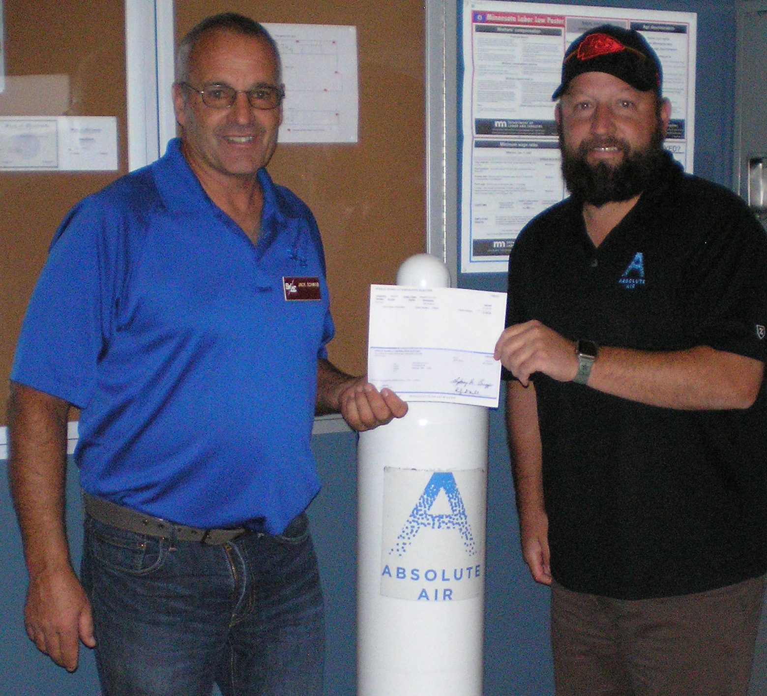 Rebate Check Presentation Absolute Air Steele Waseca Co op Electric